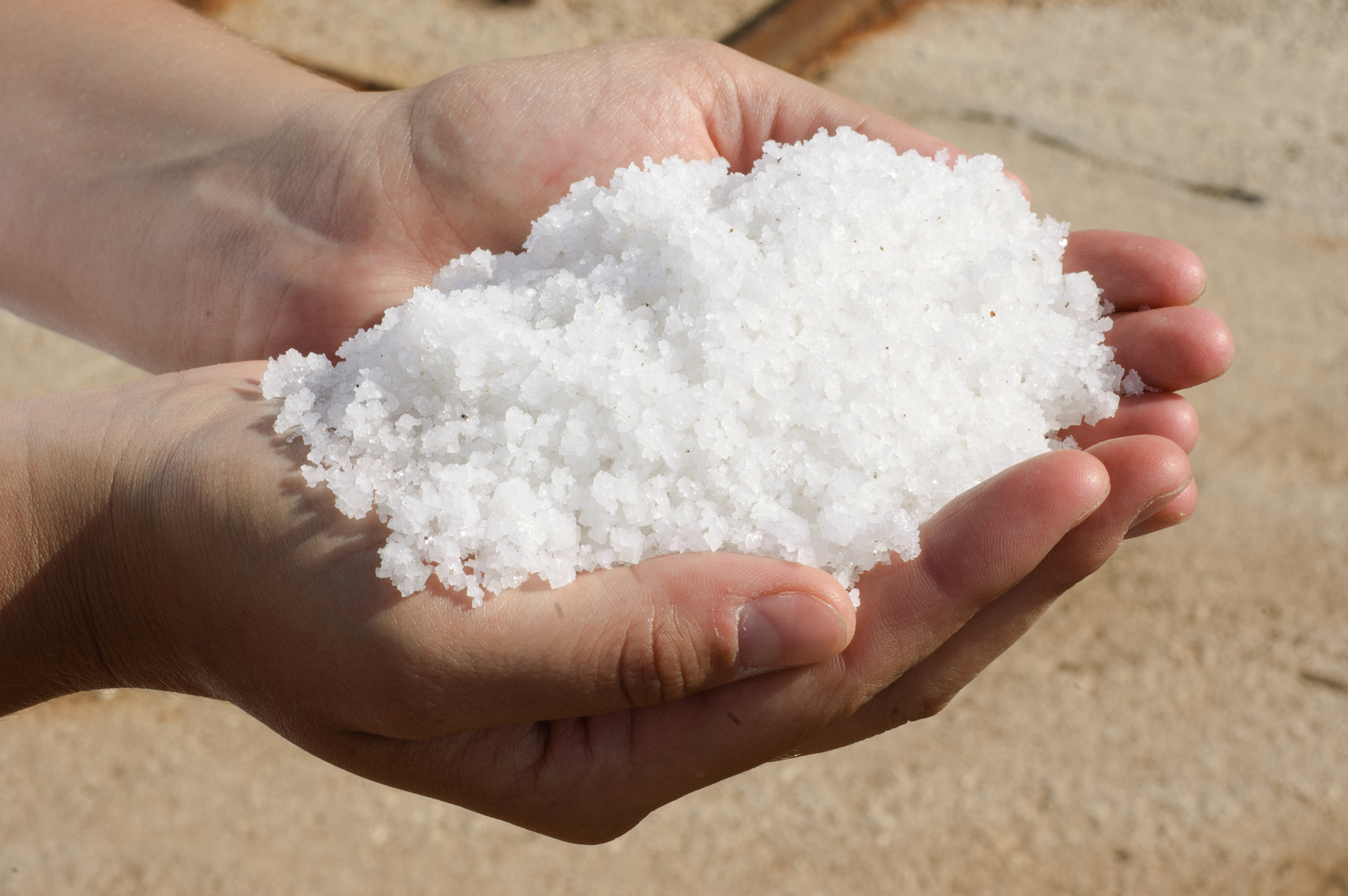 Image of a pile of freshly harvested salt, featuring Lonestar Pool Services and highlighting pool salt, ensuring it aligns with the page's context.